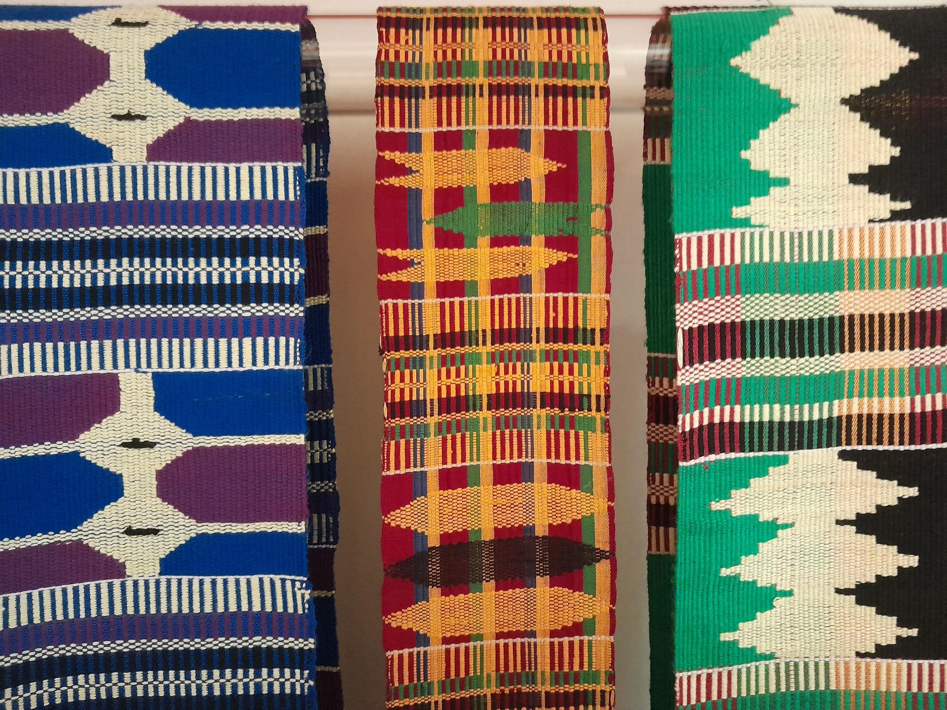 3 multicoloured pieces of woven fabric